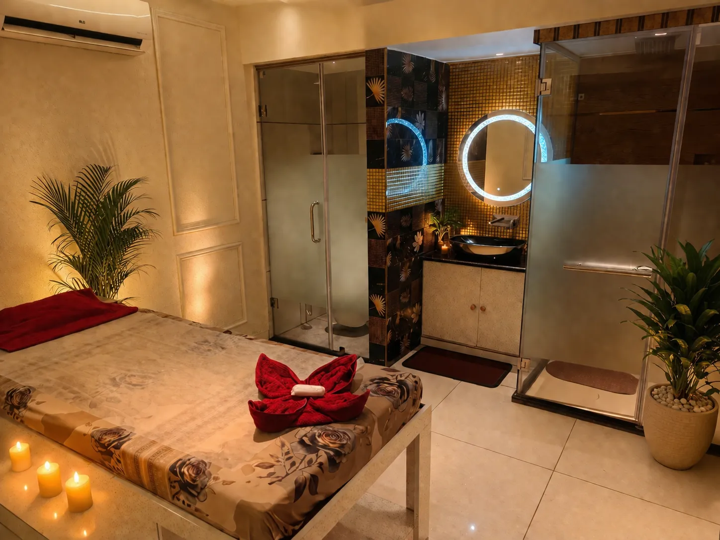 Massage bed with red towel art at Ocean Spa